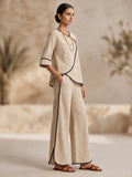 Beige V-Neck Top with Black Border Trousers