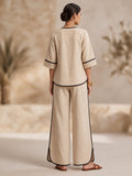 Beige V-Neck Top with Black Border Trousers